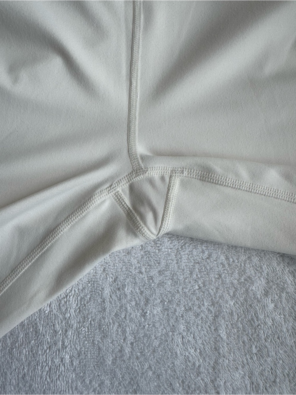 Fabletics Oasis PureLuxe High-Waisted 7/8 Legging Cream - Picture 6 of 9